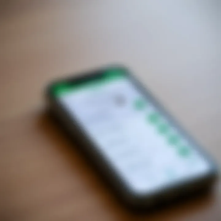 Mobile phone displaying M-Pesa withdrawal options on screen